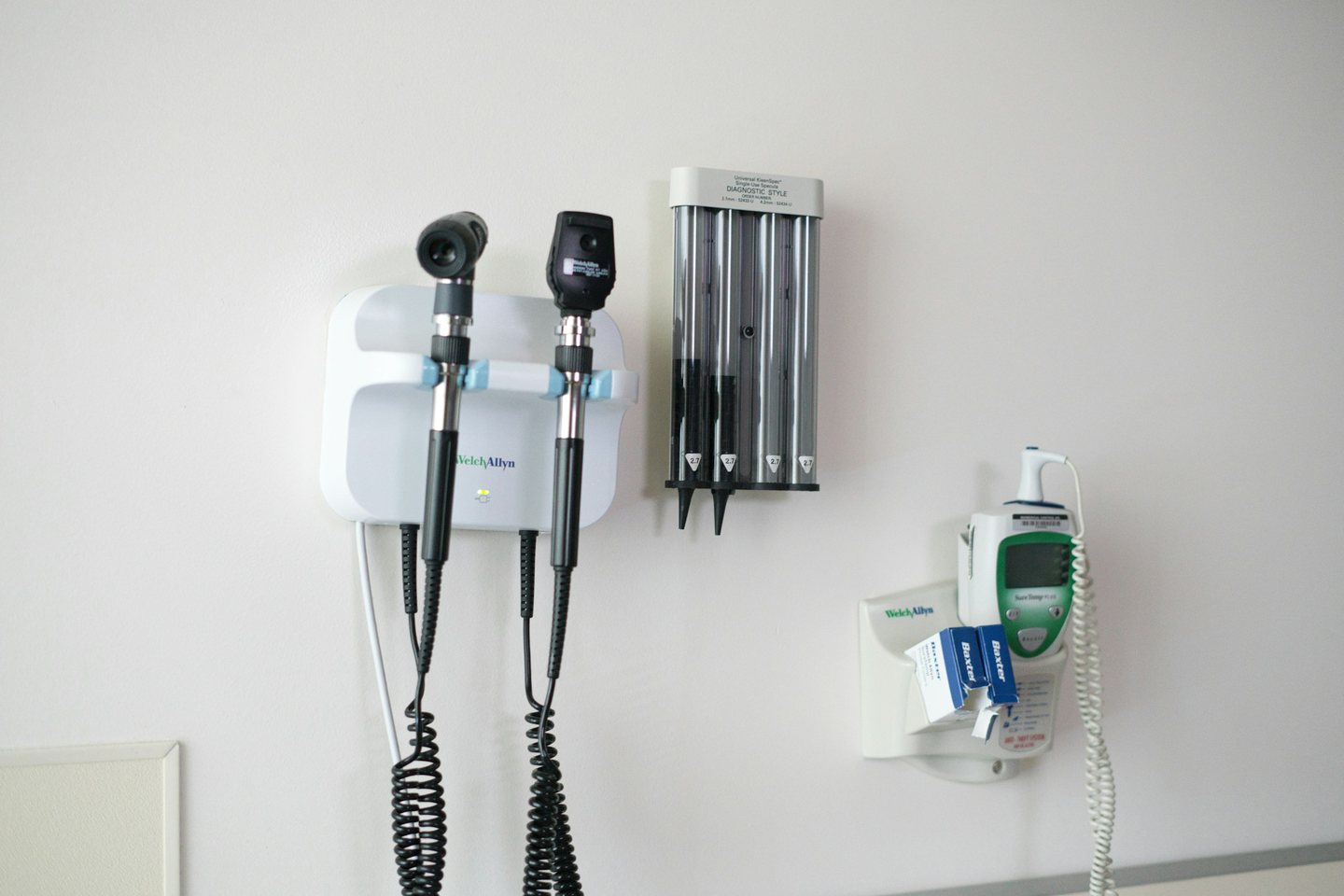 Diagnostic instruments mounted on an exam room wall
